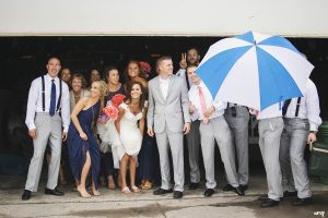 Bridal Party takes shelter from the rain on their wedding day