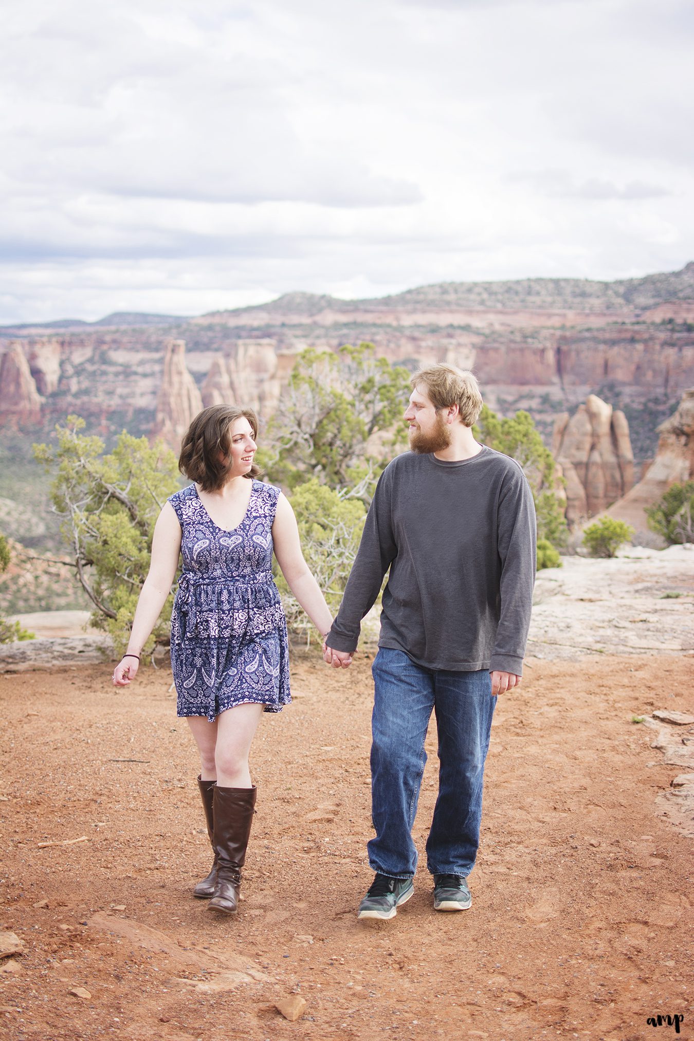 Couple walking overlooking the Colorado National Monument