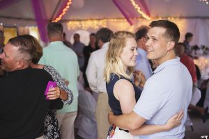couple dancing on a crowded dance floor
