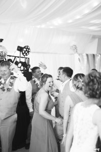 bridesmaid laughing on the dance floor