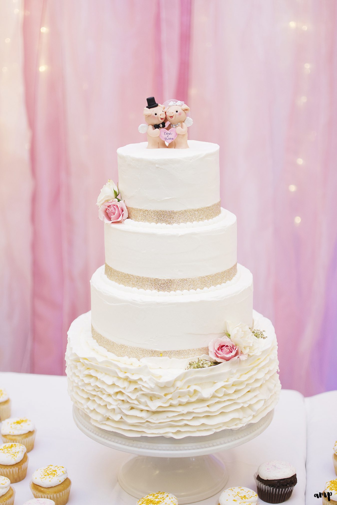Wedding cake with pigs cake topper
