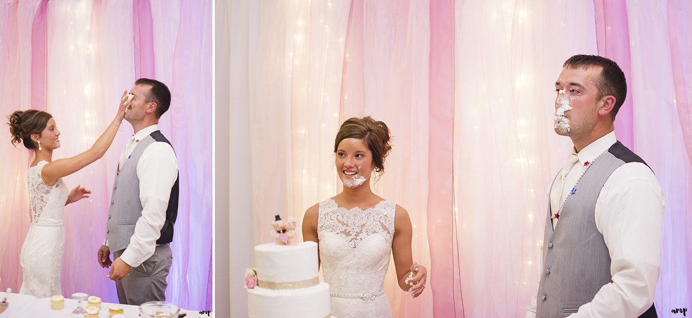 Bride and groom cutting the wedding cake