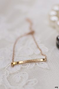 Rose gold bracelet with roman numerals of her wedding date