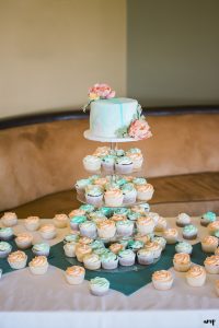 Marbled cake with tiers of cupcakes