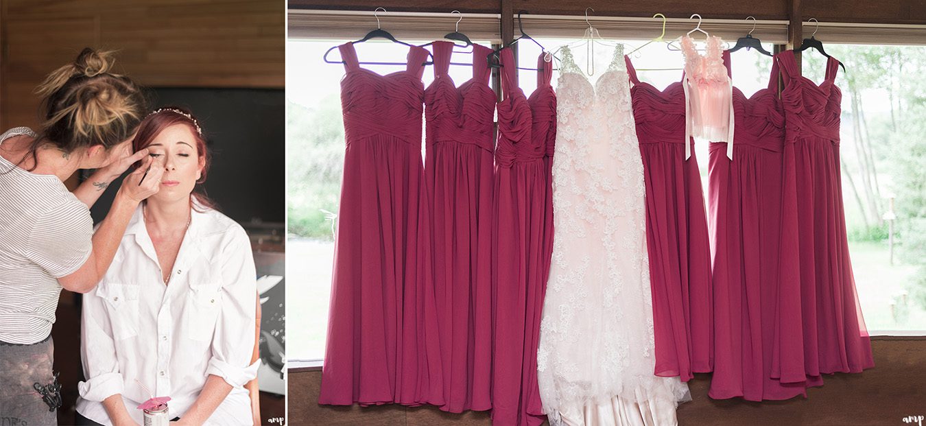 Bride getting ready and dresses hung in window