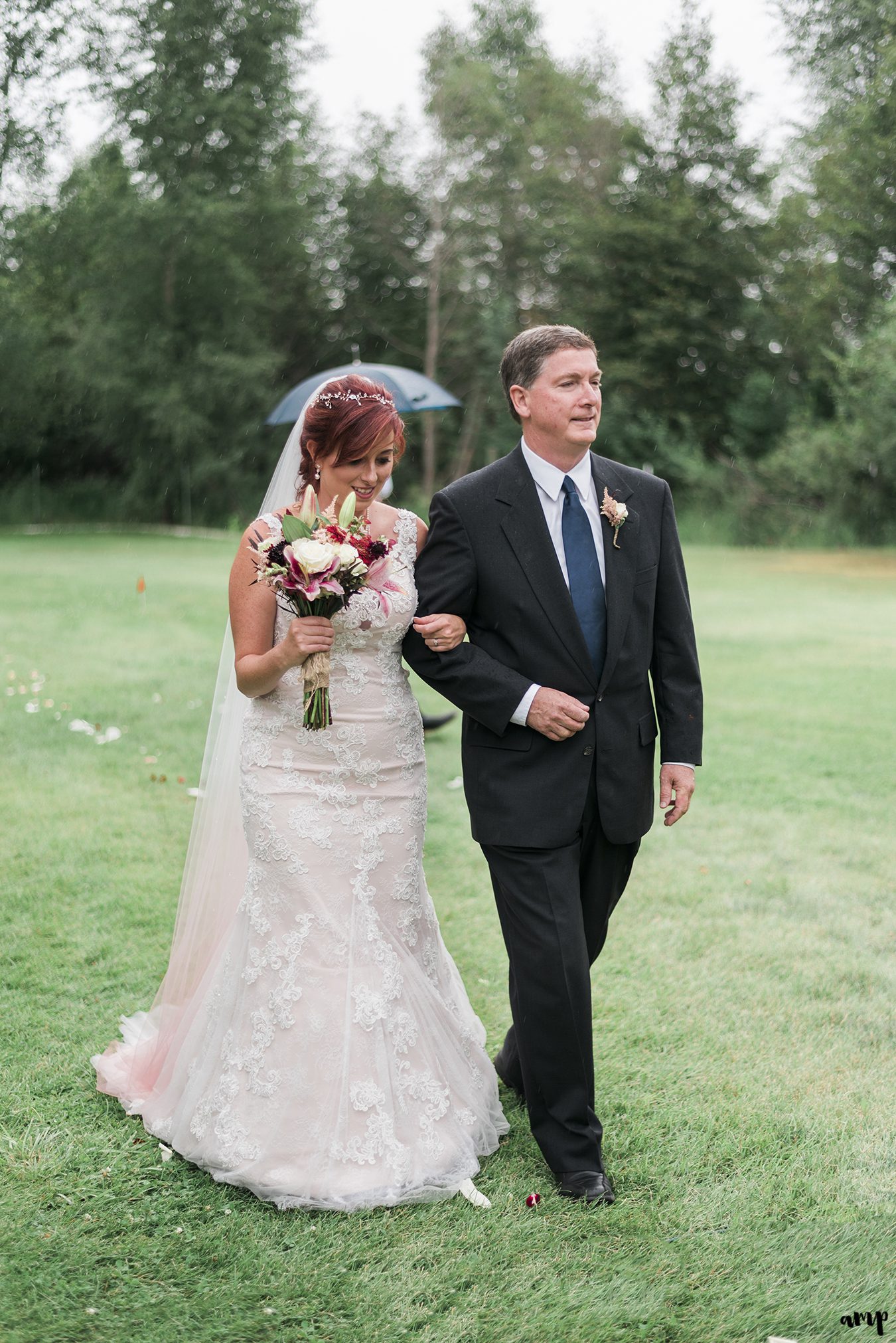 Bride and her father walking down the aisle