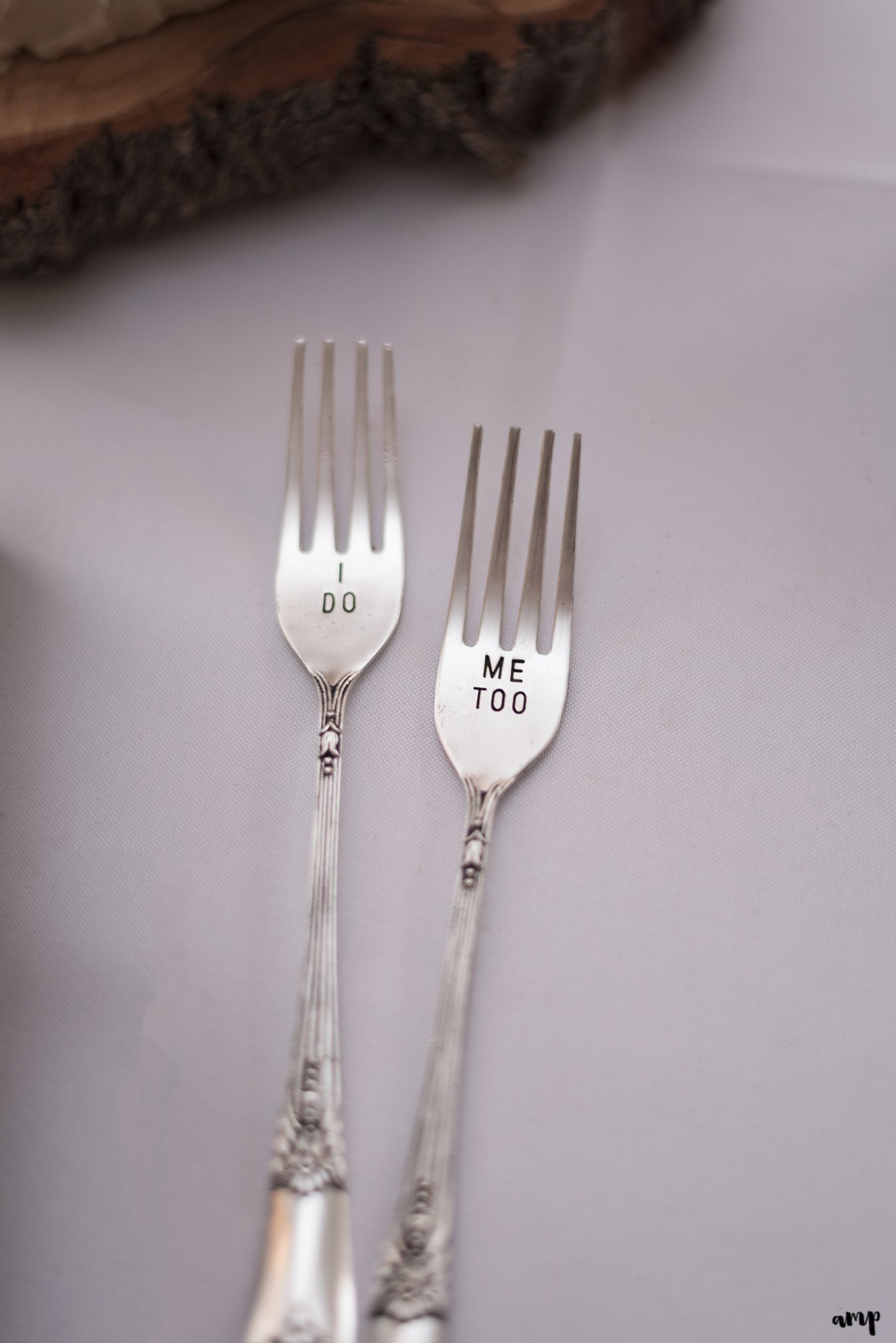 Forks inscribed with "I do" and "Me too"