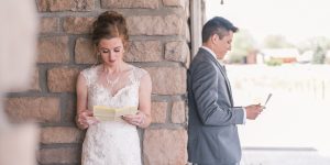 Bride and groom exchanging love letters | amanda.matilda.photography