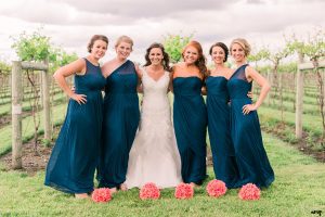 Bridesmaids dresses in navy with varying styles