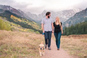 Couple walking their dog at Piney River Ranch