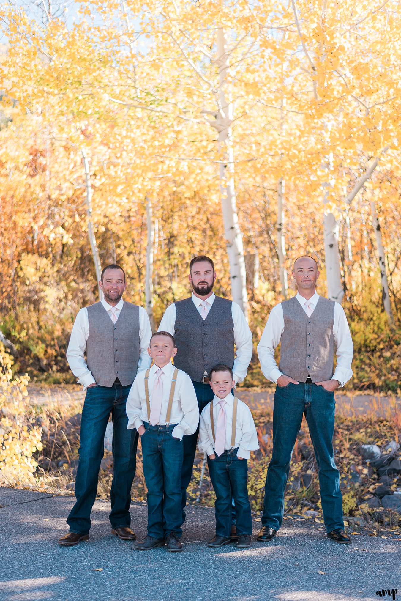 Groom and groomsmen portraits in the yellow aspen trees