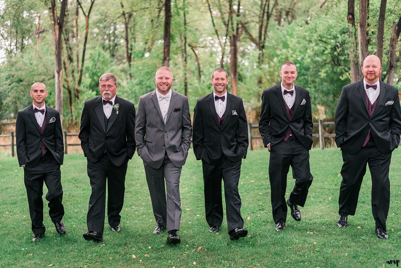 Groomsmen walking toward the camera