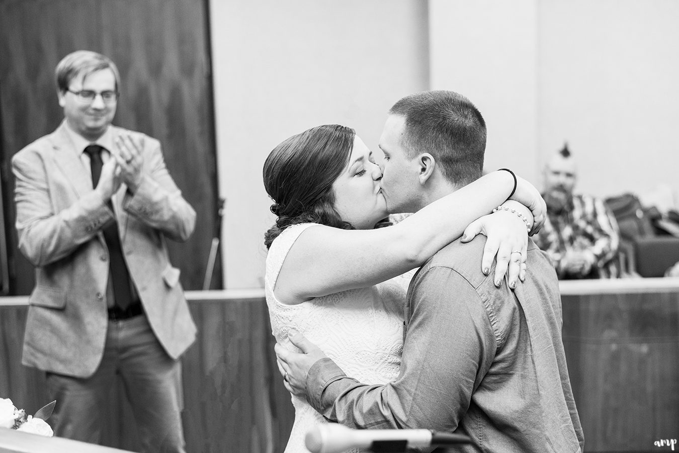 Couple kissing in the courthouse for their wedding in Omaha