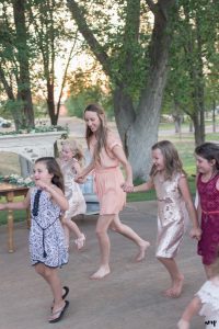 Kids run around the wedding dance floor at a Rangely Colorado Wedding