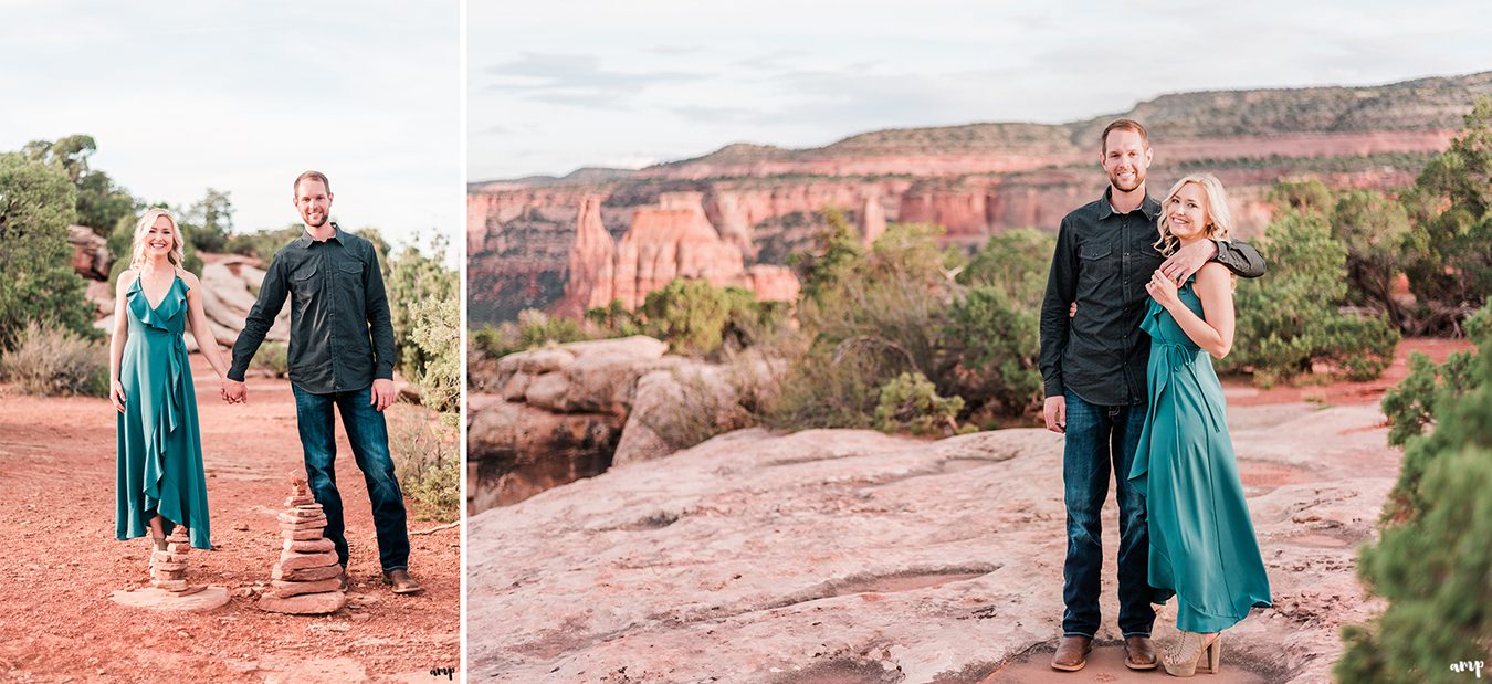 Dylan and Lexi pose by trail cairn markers for their Colorado National Monument engagement session