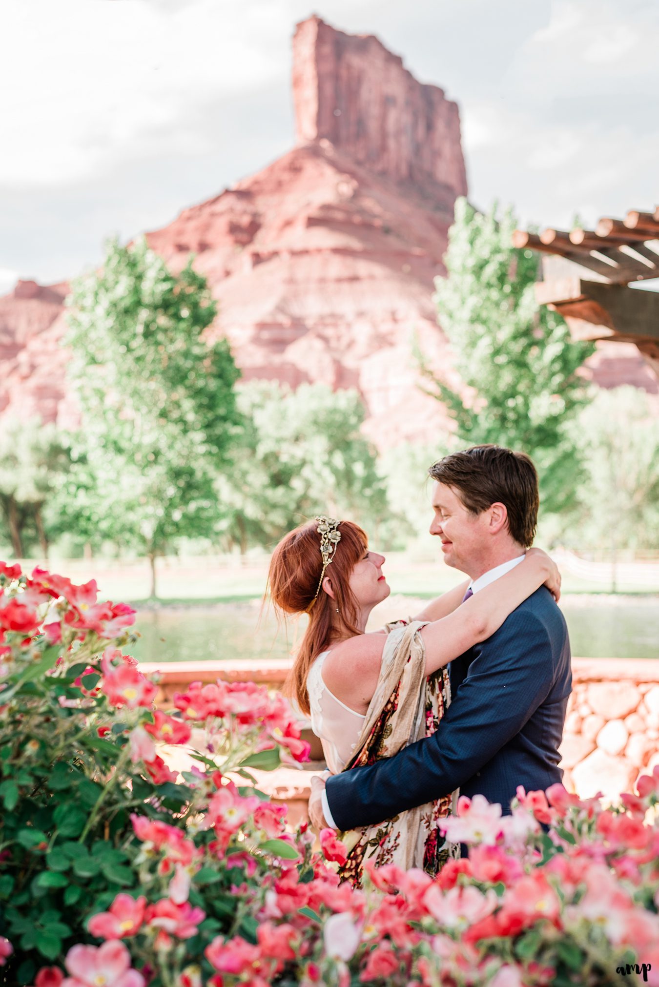 Blake and Carrie snuggling under the pergolas at Gateway Canyons Resort