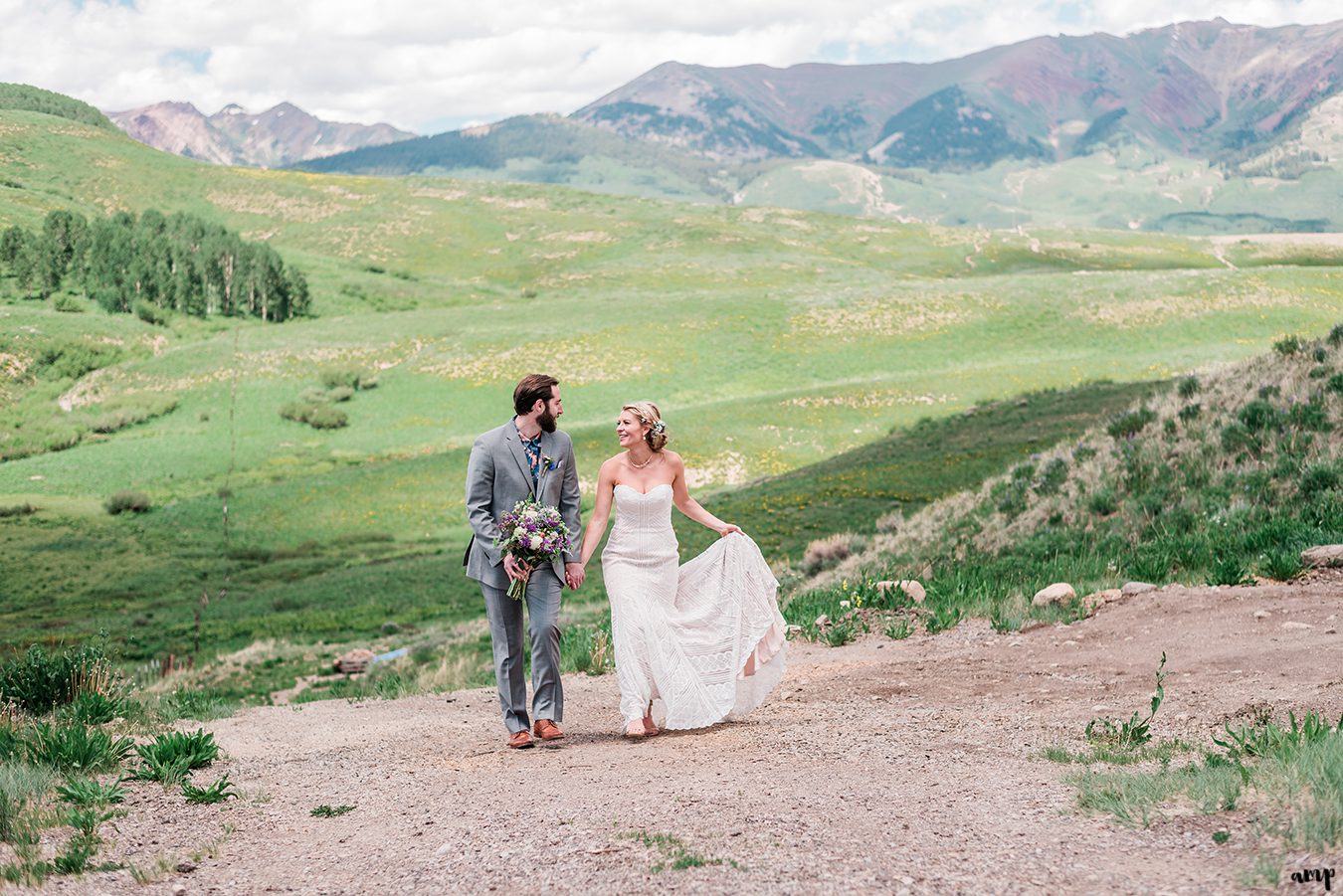 Dan and Courtney walking up the path at the Mountain Wedding Garden