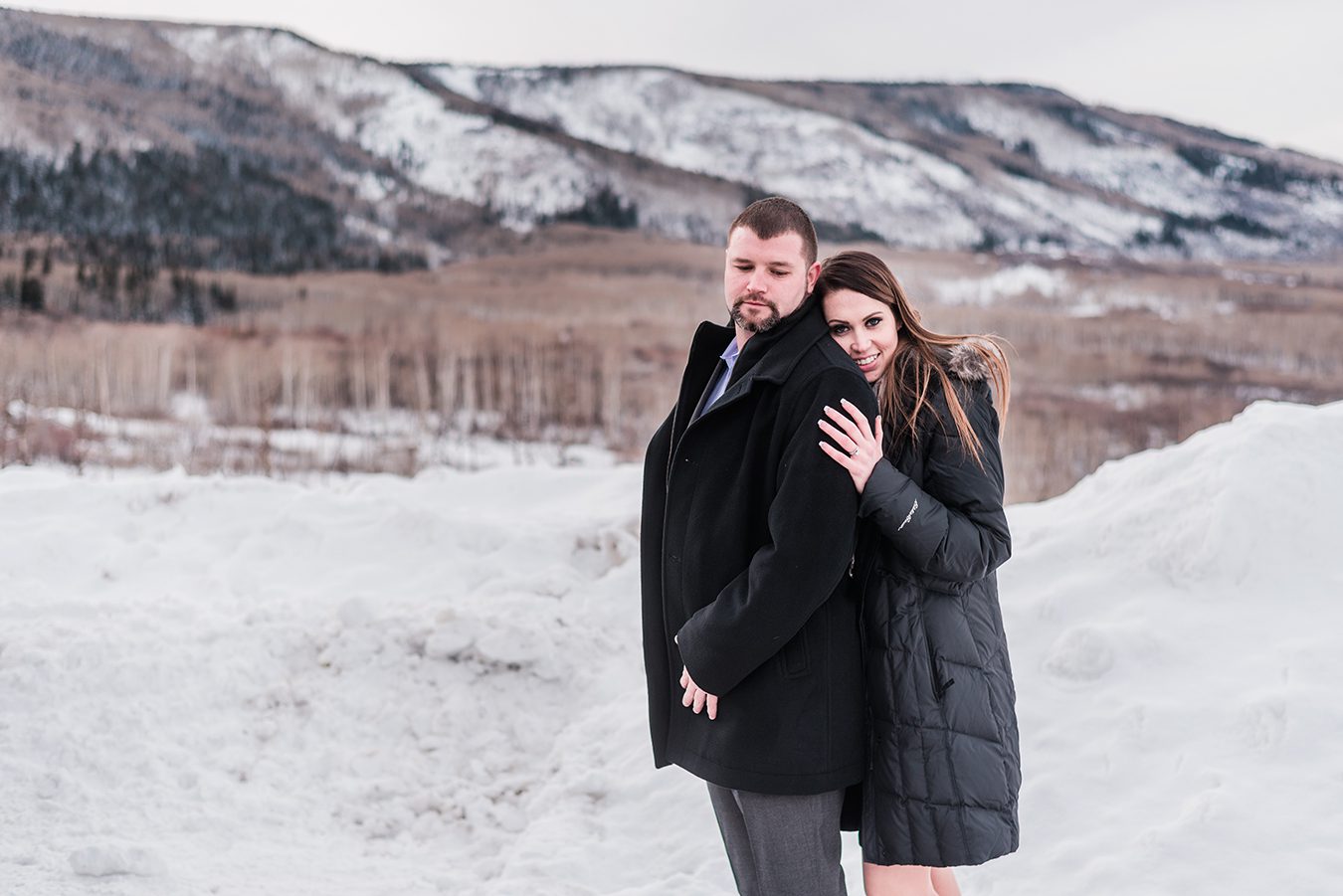 As we sat a the bar for a quick drink before their snowy engagement on the Grand Mesa, Adam and Monica recounted their proposal story to me.