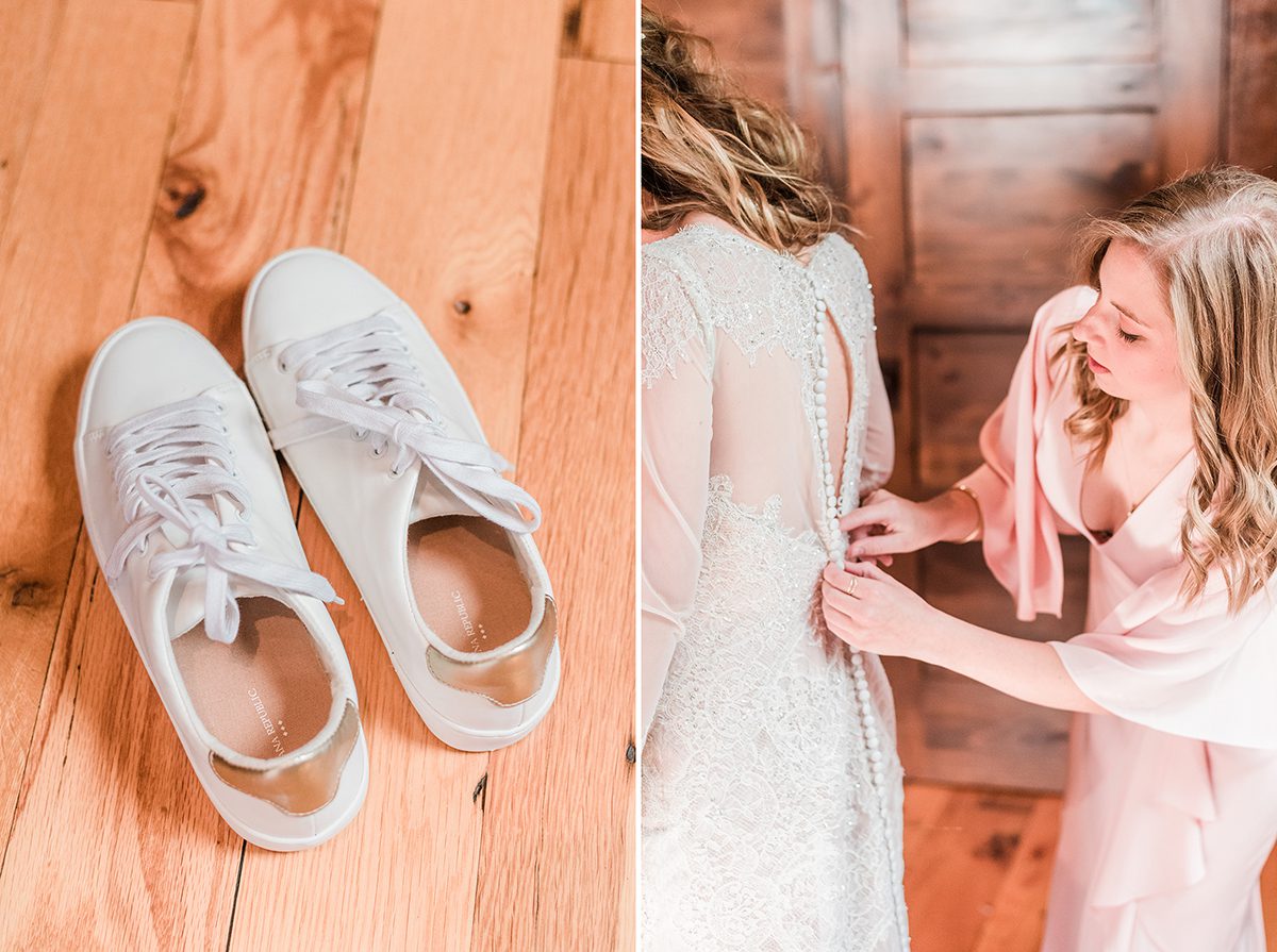 Bride's sister helping her button up dress