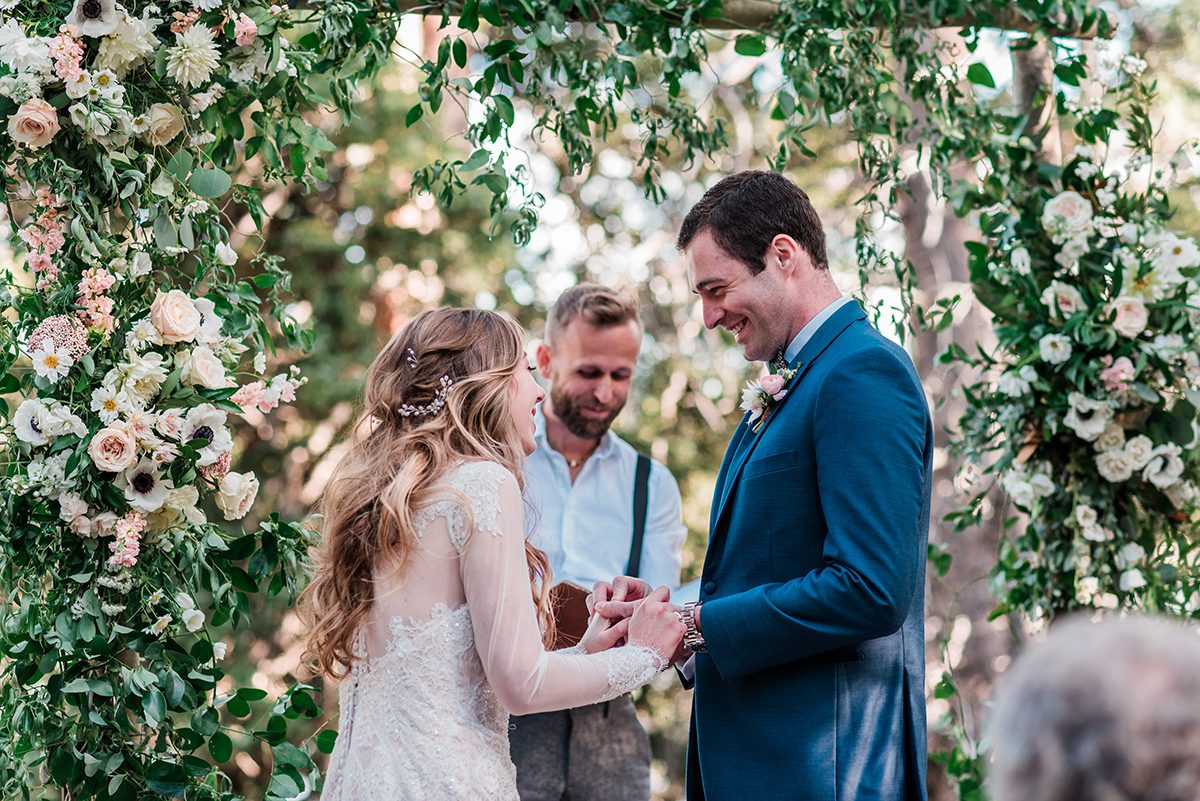 William & Amy exchange rings at their Lake Irwin Wedding in Crested Butte
