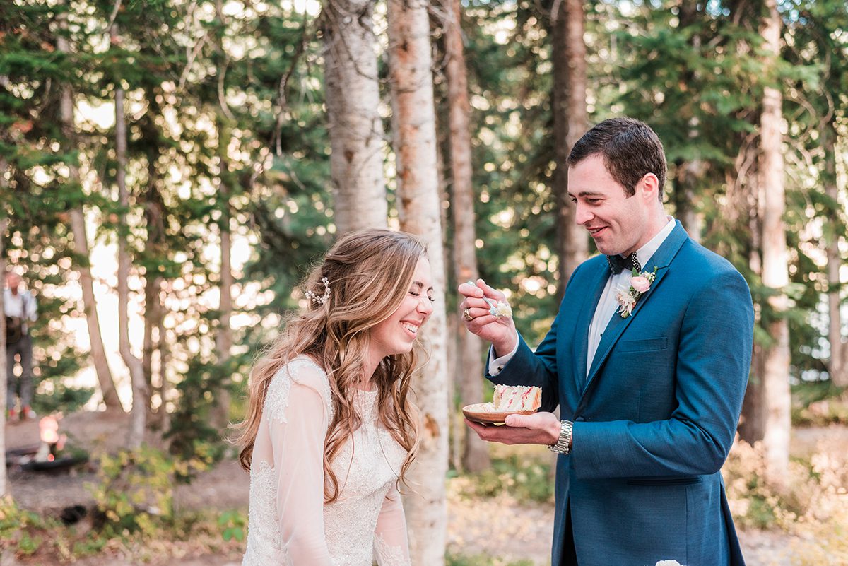 William & Amy cutting the cake at their Lake Irwin Wedding in Crested Butte