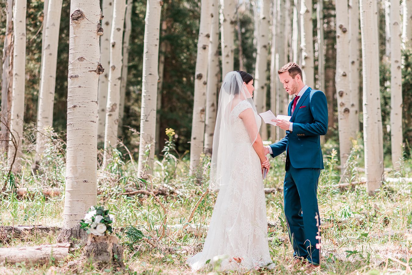 Bride and Groom exchange vows in an aspen grove during their Elopement in Glenwood Springs