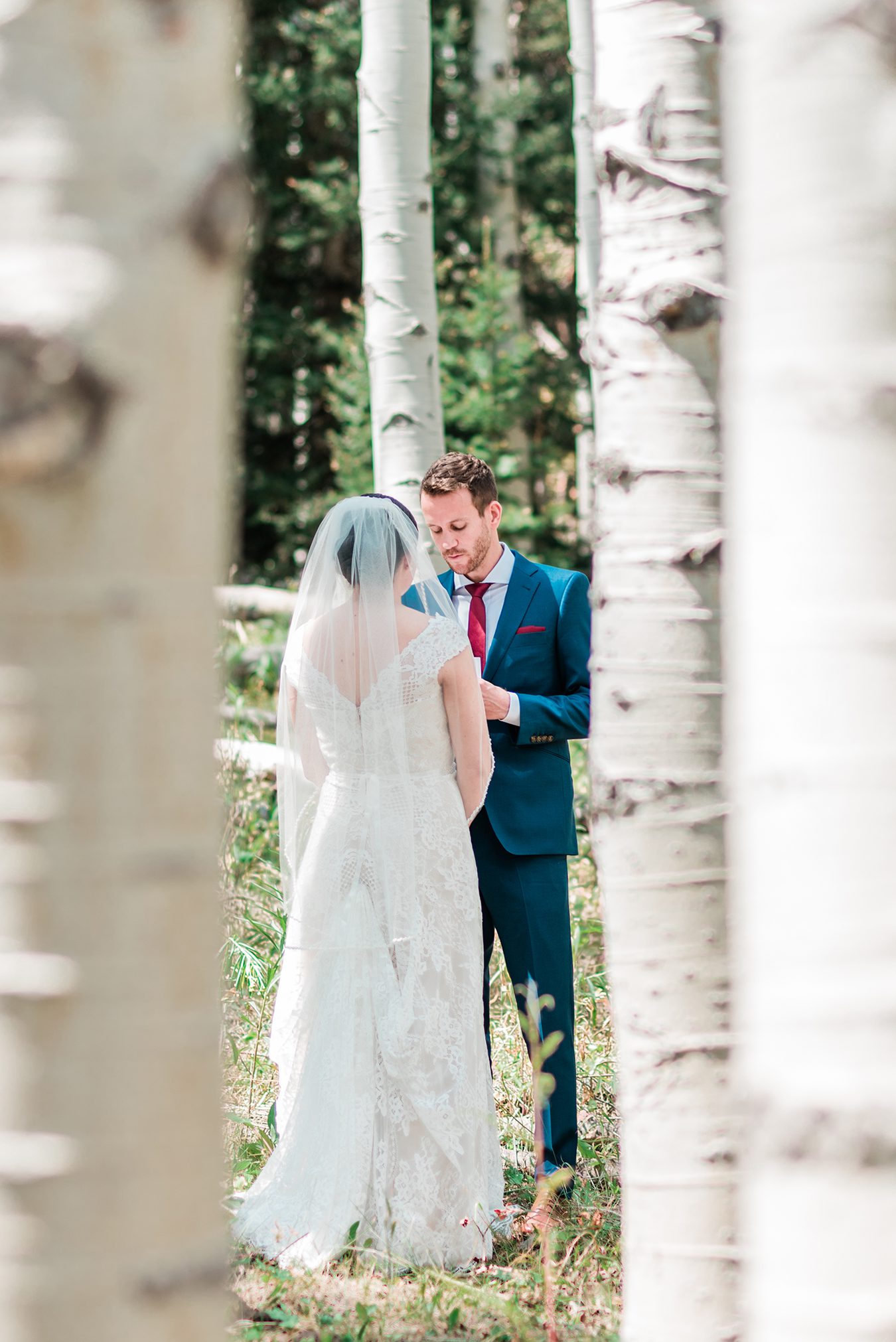 Bride and Groom exchange vows in an aspen grove during their Elopement in Glenwood Springs